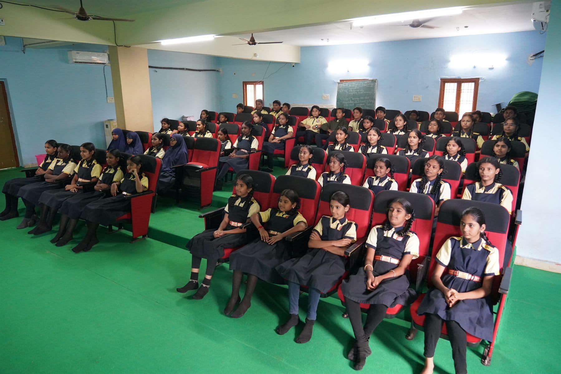 Students seated inside the amphi theater
