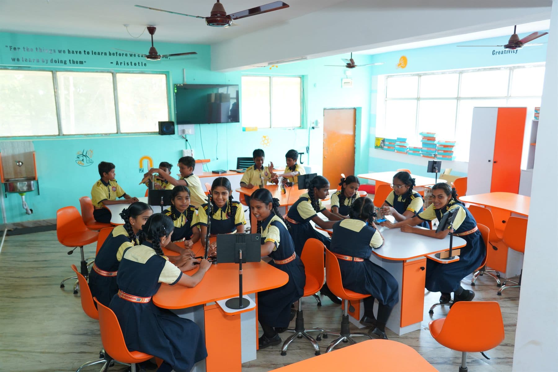 Students collaborating in the innovation classroom