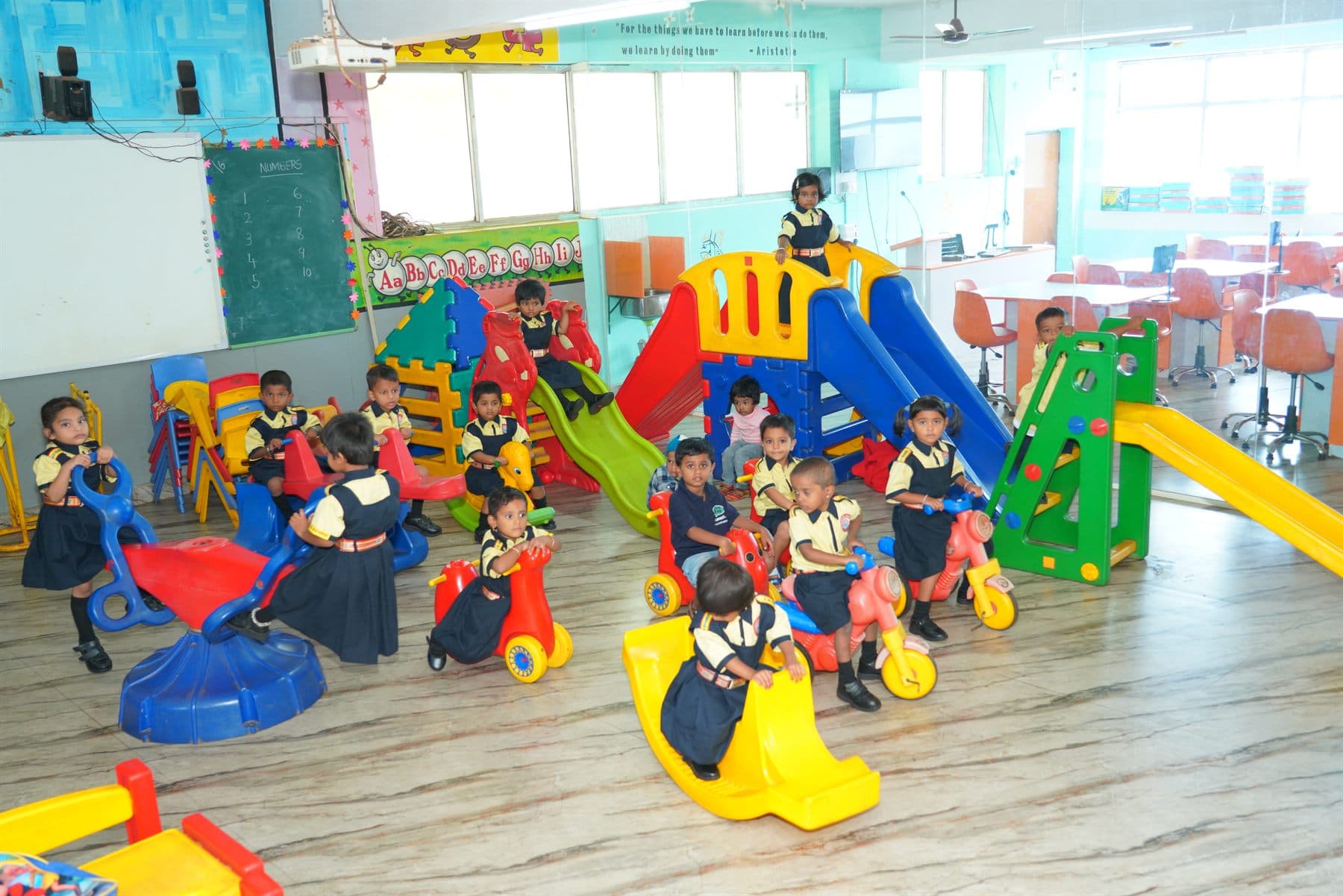 Montessori children using the indoor play area