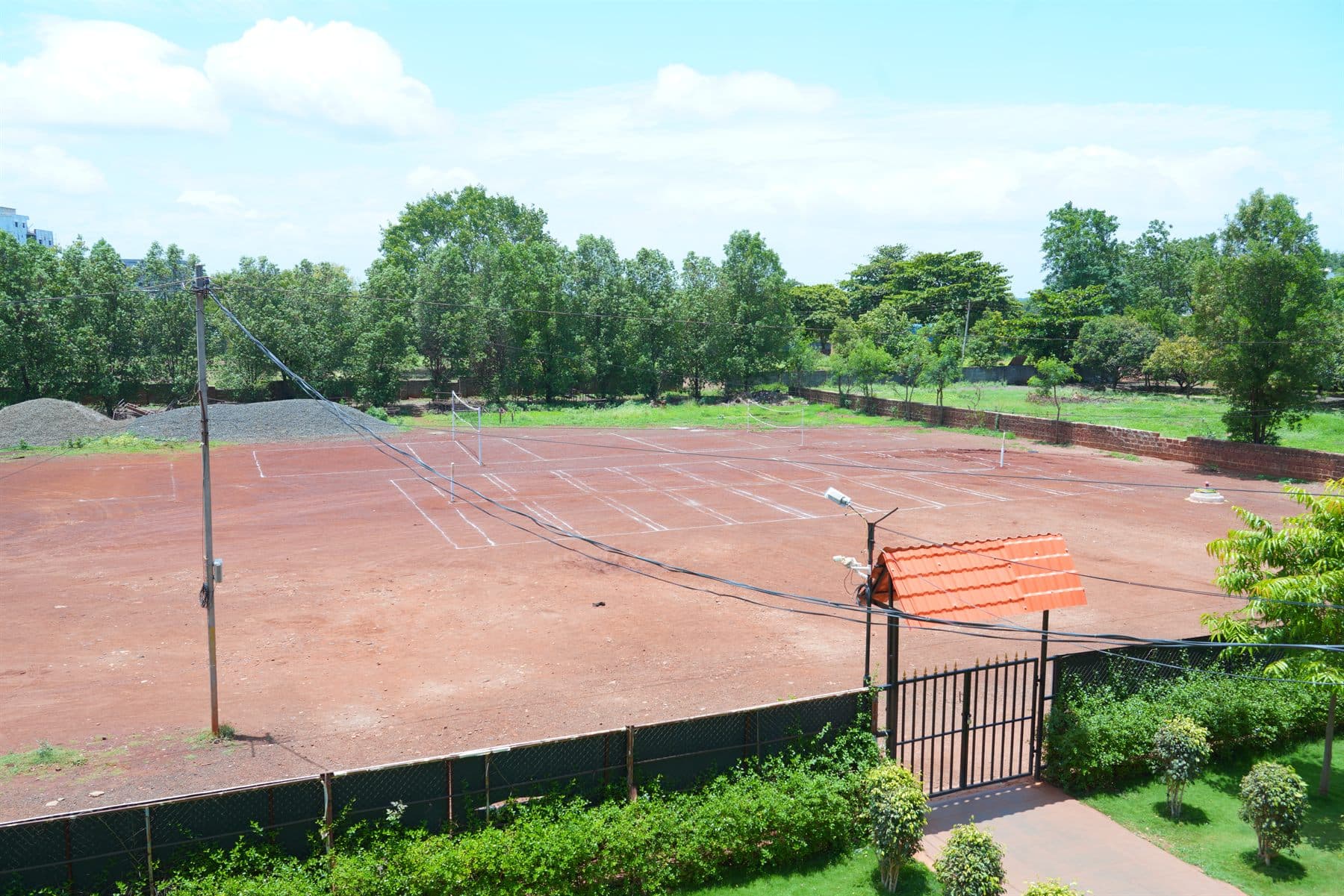 Large school playground with marked sports courts
