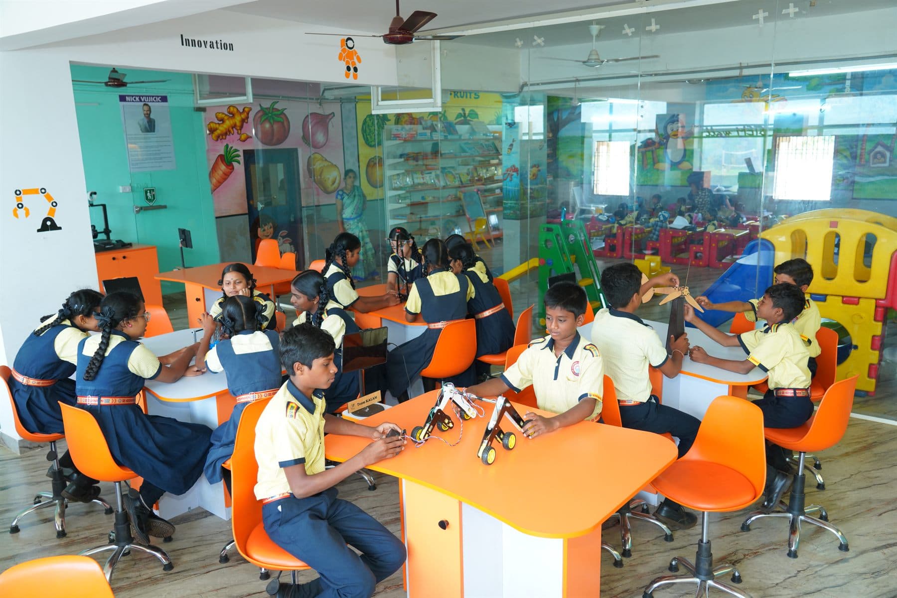 Students working together in the Cogno Space activity room